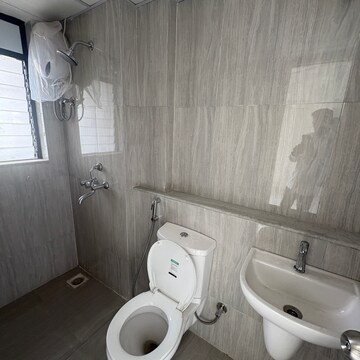 Bathroom in 1 BHK Apartment at Runwal Gardens Phase 2, Kalyan Shilphata Road – for Rent