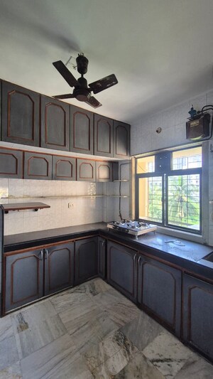 Kitchen in 3 BHK Apartment at New India Grace Luxuria, Malad West – for Rent
