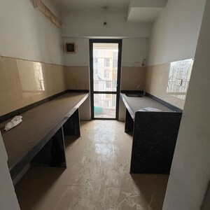 Kitchen in 2 BHK Apartment at Lodha Lakeshore Greens, Hedutane – for Sale