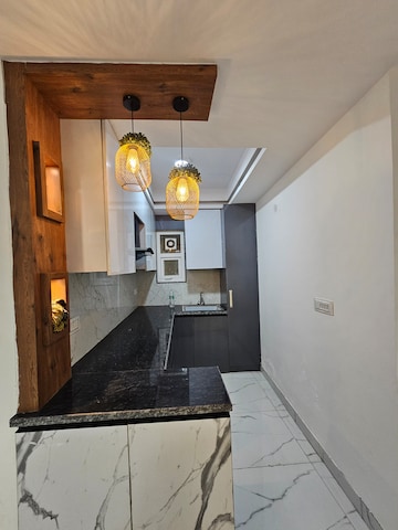 Kitchen in 2 BHK Builder Floor at Rajpur Khurd Extension – for Sale