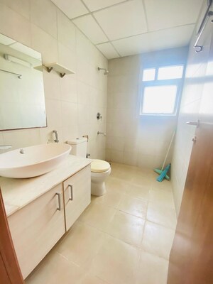 Bathroom in 2 BHK Apartment at Bhartiya City Nikoo Homes II, Thanisandra Main Road – for Rent