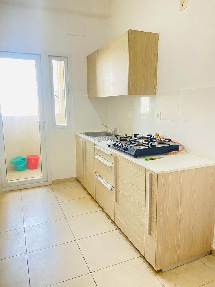 Kitchen, bhartiya-city-nikoo-homes-ii 2 Bedroom 1106 Sq.Ft. Apartment In Thanisandra Main Road Bangalore 9398361