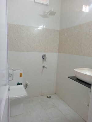 Bathroom in 2 BHK Apartment at Arun Vihar Sector 37, Sector 37 – for Rent