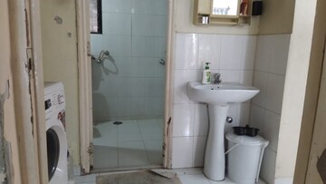 Bathroom in 2 BHK Apartment at Motiram Nagar Apartment, Warje – for Rent