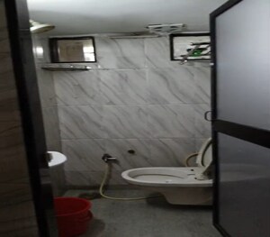 Bathroom in 2 BHK Apartment at Matunga East – for Rent