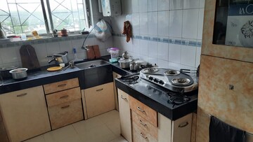 Kitchen in 2 BHK Apartment at Mahalaxmi Nagar CHS, Warje – for Rent