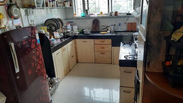 Kitchen in 2 BHK Apartment at Mahalaxmi Nagar CHS, Warje – for Rent