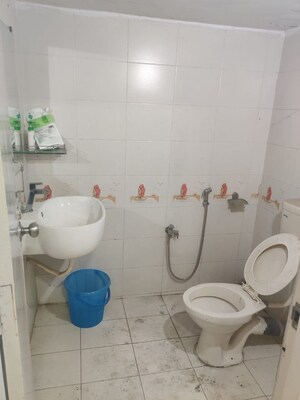 Bathroom in  Office Space at Kamdhenu 23 West, T.T.C. Industrial Area – for Rent