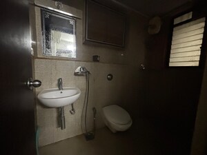Bathroom in 1.5 BHK Apartment at Lodha Palava City Lakeshore Greens, Dombivli East – for Rent