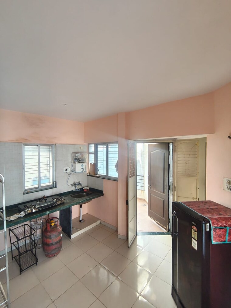 Kitchen, karan-rhea 1 Bedroom 575 Sq.Ft. Apartment In Wadegaon Pune 9398812