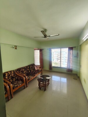 Living Room in 1 BHK Apartment at Karan Rhea, Wadegaon – for Rent