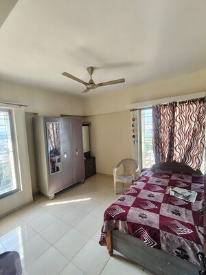 Bedroom in 1 BHK Apartment at Karan Rhea, Wadegaon – for Rent