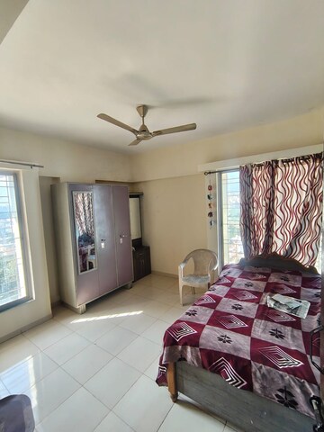 Bedroom in 1 BHK Apartment at Karan Rhea, Wadegaon – for Rent