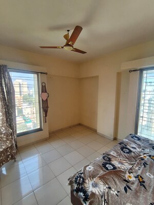 Bedroom in 1 BHK Apartment at Karan Rhea, Wadegaon – for Rent