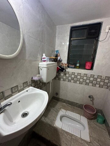 Bathroom in 1.5 BHK Apartment at Om CHS Sion, Sion – for Rent