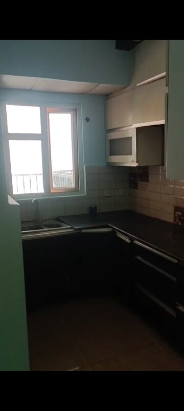Kitchen in 2 BHK Apartment at Gaur City 2 - 14th Avenue, Sector 16c Greater Noida – for Rent