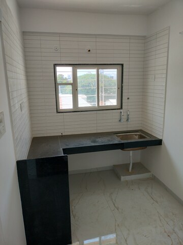 Kitchen in 1 BHK Apartment at Wadgaon Sheri – for Rent