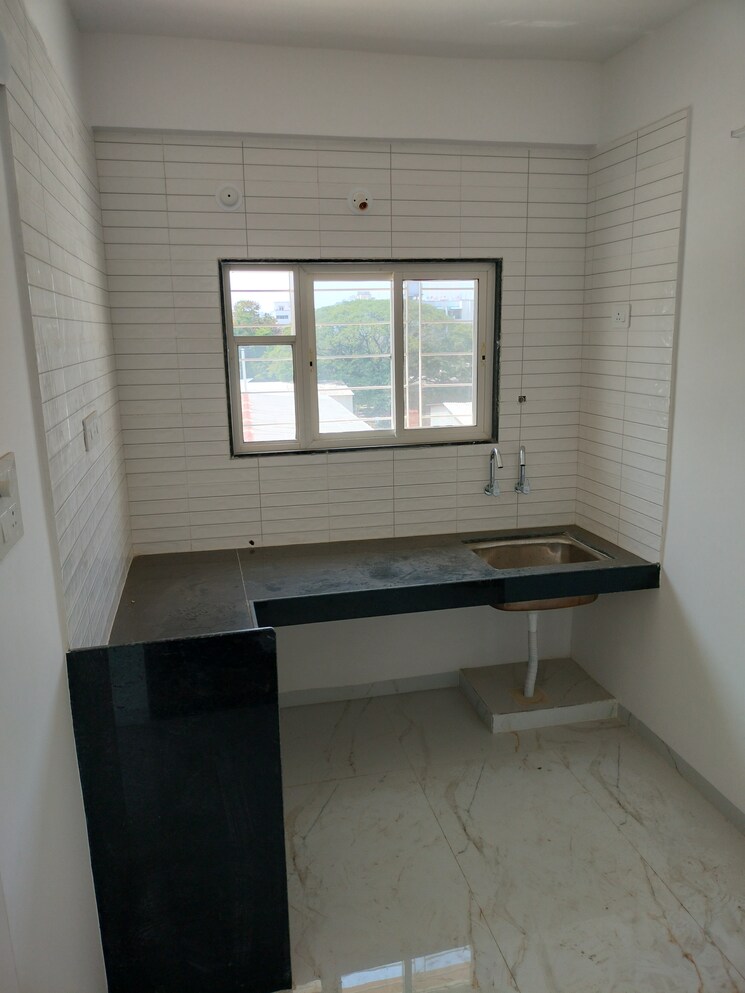 Kitchen, wadgaon sheri 1 Bedroom 550 Sq.Ft. Apartment In Wadgaon Sheri Pune 9399343