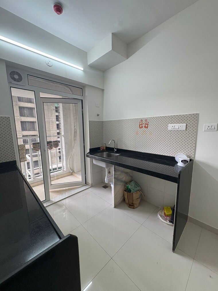 Kitchen, lodha-amara 2 Bedroom 618 Sq.Ft. Apartment In Kolshet Road Thane 9399338