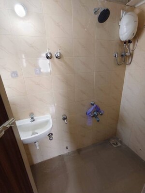 Bathroom in 2 BHK Apartment at Andheri CHS, Andheri West – for Rent