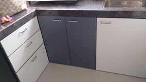 Kitchen in 2 BHK Apartment at Andheri CHS, Andheri West – for Rent