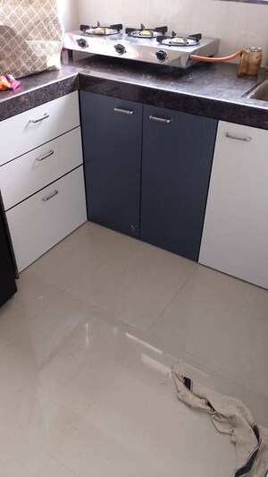 Kitchen in 2 BHK Apartment at Andheri CHS, Andheri West – for Rent