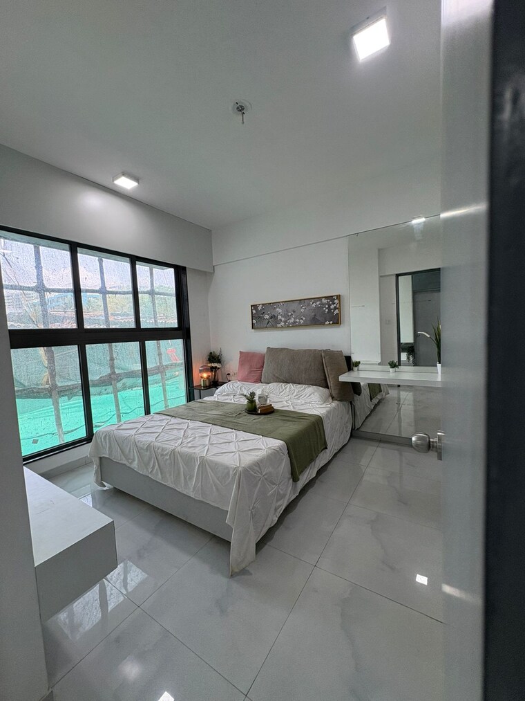 Bedroom, uk-iona 2 Bedroom 552 Sq.Ft. Apartment In Andheri East Mumbai 9399545