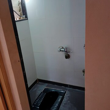 Bathroom in 1 BHK Apartment at Swapnalok Apartment Andheri, Andheri East – for Rent