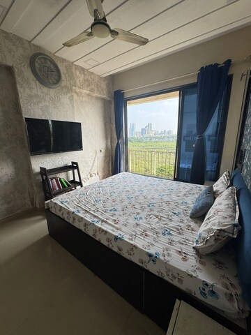 Bedroom in 2 BHK Apartment at Jinay CHS, Kandivali West – for Sale