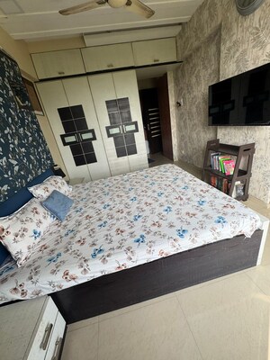 Bedroom in 2 BHK Apartment at Jinay CHS, Kandivali West – for Sale