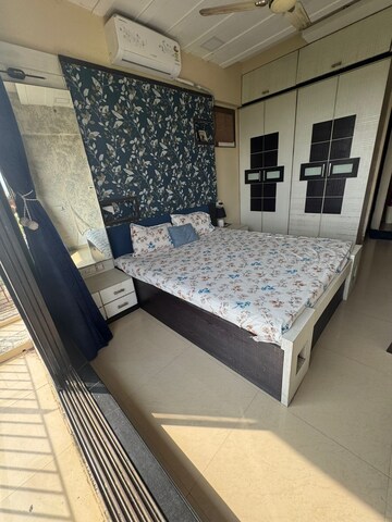 Bedroom in 2 BHK Apartment at Jinay CHS, Kandivali West – for Sale