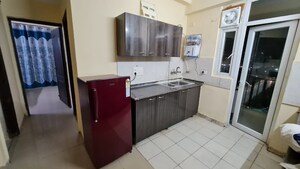 Kitchen in 2.5 BHK Apartment at Amrapali Princely Estate, Sector 76 – for Rent