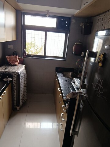 Kitchen in 1 BHK Apartment at Shree Abhishek CHS, Kandivali West – for Sale
