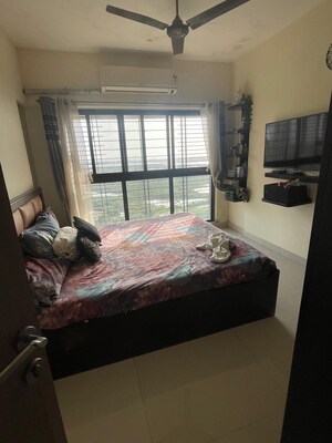 Bedroom in 1 BHK Apartment at Rustomjee Meridian, Kandivali West – for Rent