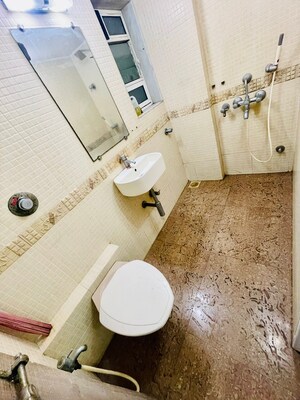 Bathroom in 2 BHK Apartment at Andheri CHS, Andheri West – for Rent