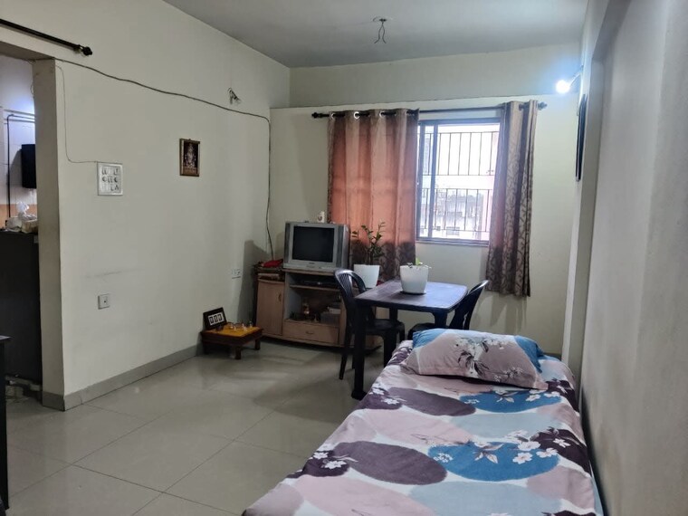 Living Room, magarpatta-city-heliconia 1 Bedroom 750 Sq.Ft. Apartment In Hadapsar Pune 9399715