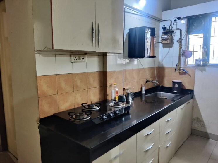 Kitchen, magarpatta-city-heliconia 1 Bedroom 750 Sq.Ft. Apartment In Hadapsar Pune 9399715