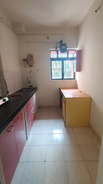 Kitchen in 1 BHK Apartment at Rajnigandha CHS Vasant Vihar, Vasant Vihar – for Rent
