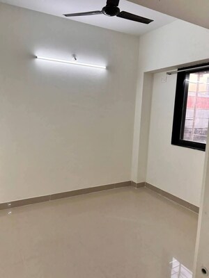 Room in 2 BHK Apartment at Andheri CHS, Andheri West – for Rent