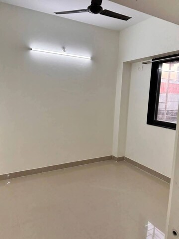 Room in 2 BHK Apartment at Andheri CHS, Andheri West – for Rent