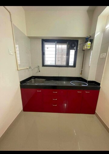 Kitchen in 2 BHK Apartment at Andheri CHS, Andheri West – for Rent