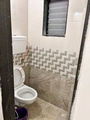 Bathroom in 2 BHK Apartment at Andheri CHS, Andheri West – for Rent