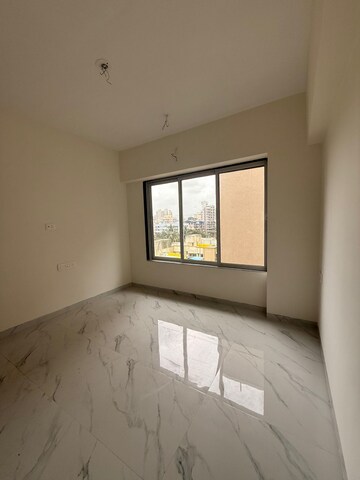 Bedroom in 2 BHK Apartment at Vraj Gateway Aparna CHS, Borivali West – for Rent