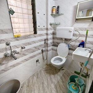 Bathroom in 2 BHK Apartment at Kshitij CHS, Goregaon East – for Rent