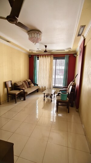 Living Room in 2 BHK Apartment at Kshitij CHS, Goregaon East – for Rent