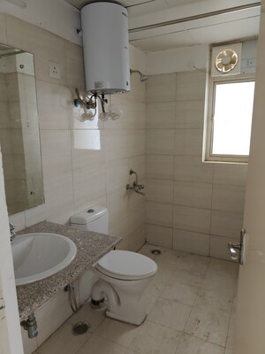 Bathroom in 3.5 BHK Apartment at Emaar Palm Gardens, Sector 83 – for Rent