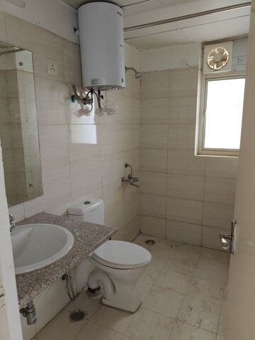 Bathroom in 3.5 BHK Apartment at Emaar Palm Gardens, Sector 83 – for Rent