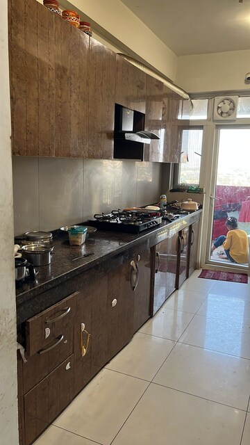 Kitchen in 3 BHK Apartment at Emaar Palm Gardens, Sector 83 – for Rent