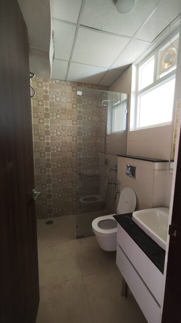 Bathroom in 3 BHK Apartment at Maya Green Lotus Saksham, International Airport Road – for Rent