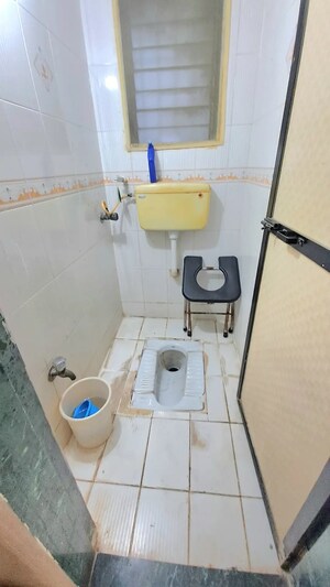 Bathroom in 1 BHK Apartment at Dharti Orange Heights, Morya Nagar – for Sale